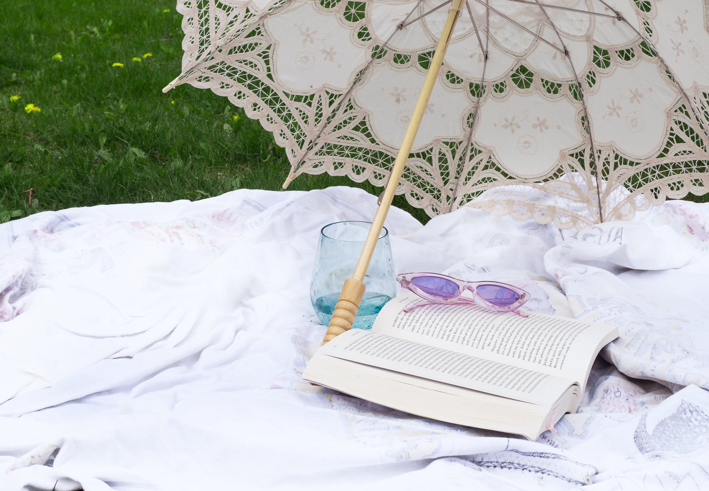 Sun umbrella and book for shade
