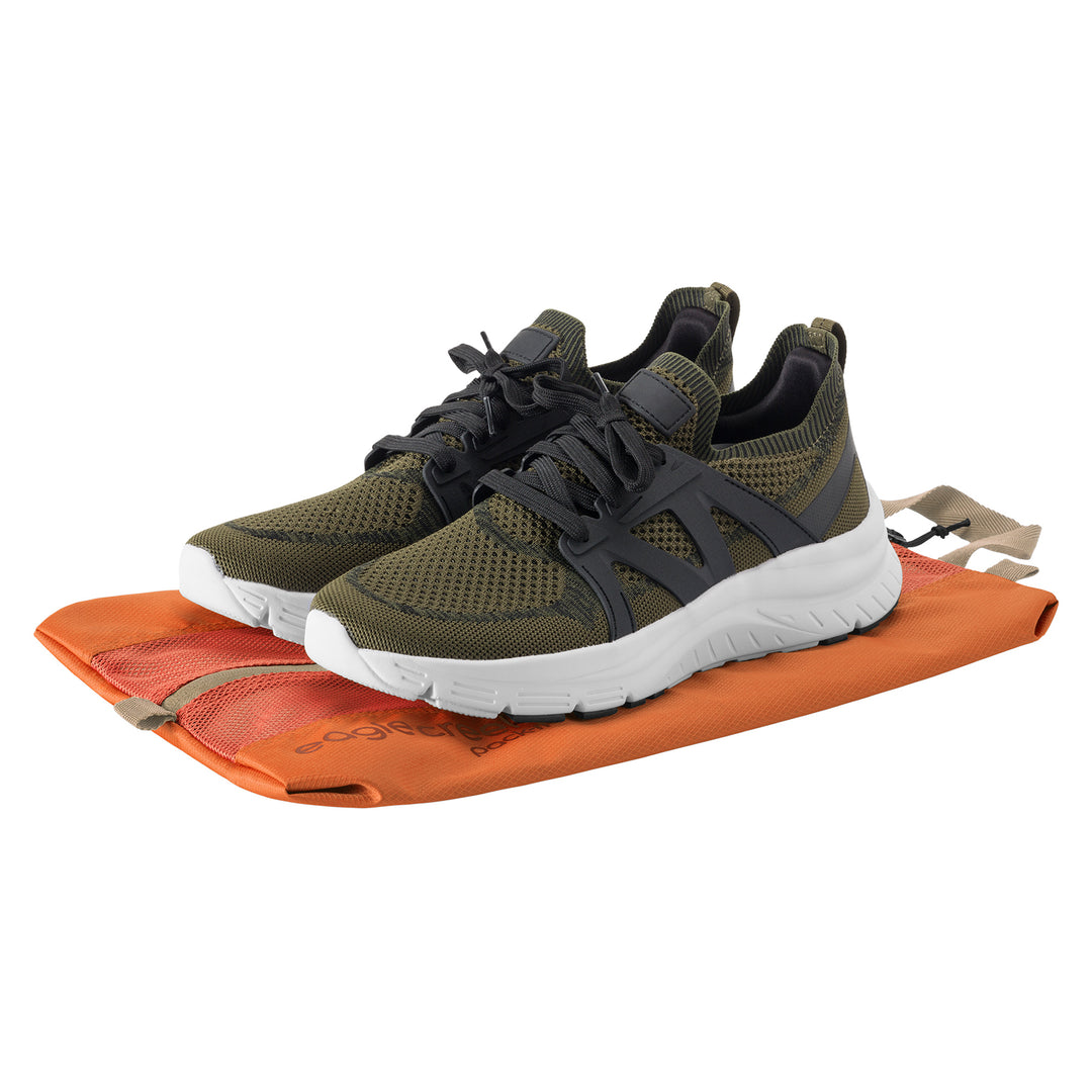 Eagle Creek Pack-It® Reveal Shoe Sack color orange with mens green running shoes