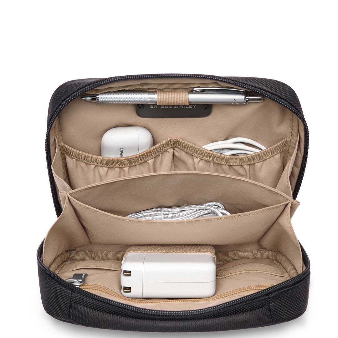 Zippered tech kit beige interior view with cables, chargers and pen