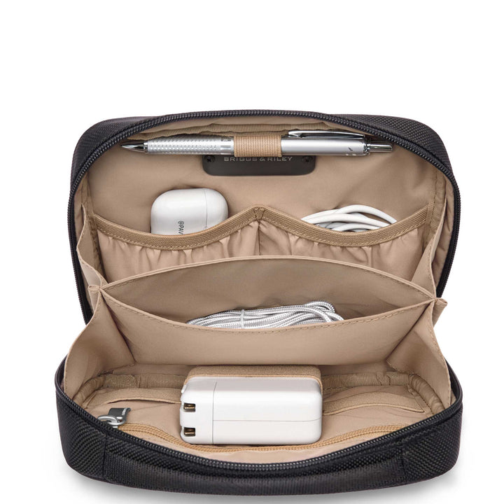 Zippered tech kit beige interior view with cables, chargers and pen