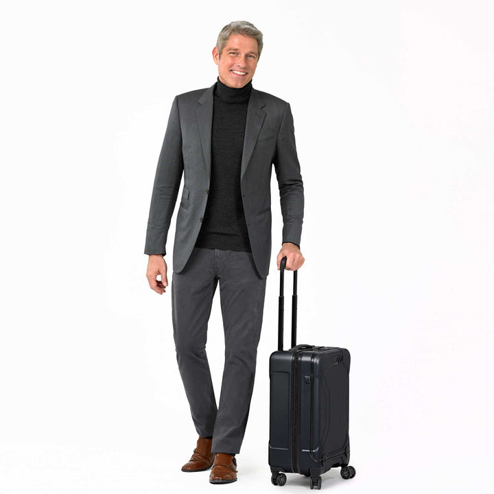 man modeling black international carry on