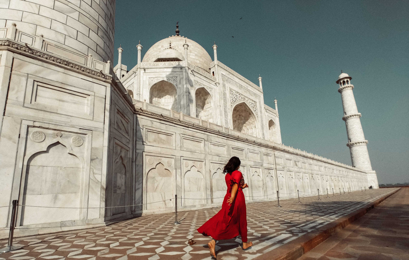 Woman in Red Dress at Taj Mahal