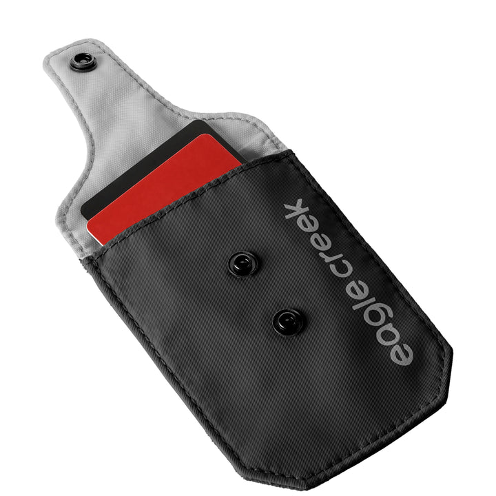 Eagle Creek Undercover RFID Bra Pouch in color black with grey lining holding two credit cards