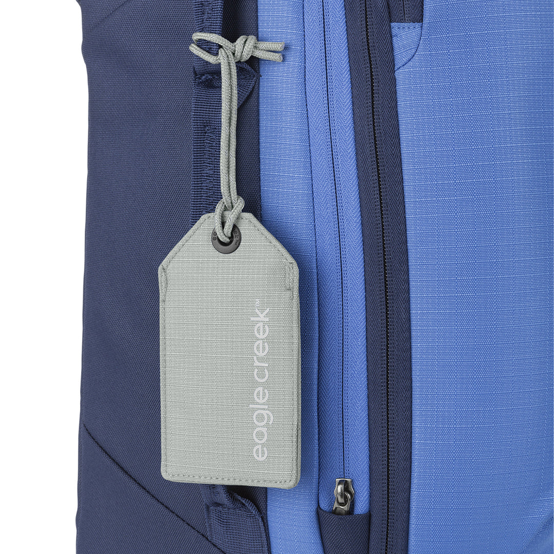 Grey color Eagle Creek Reflective Luggage Tag hanging from suitcase