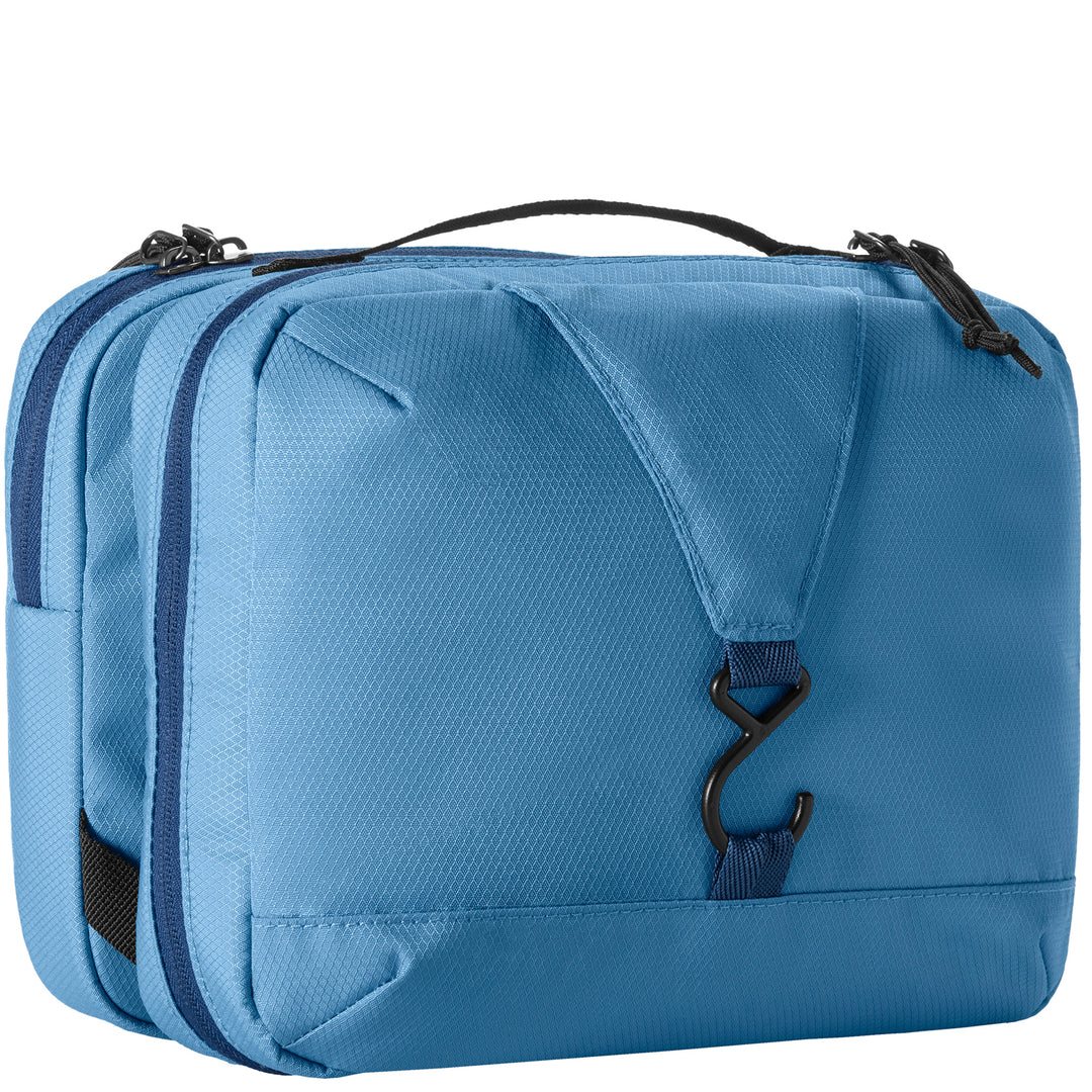 Eagle Creek Pack-It® Trifold Toiletry Kit blue back view with zippers and hook
