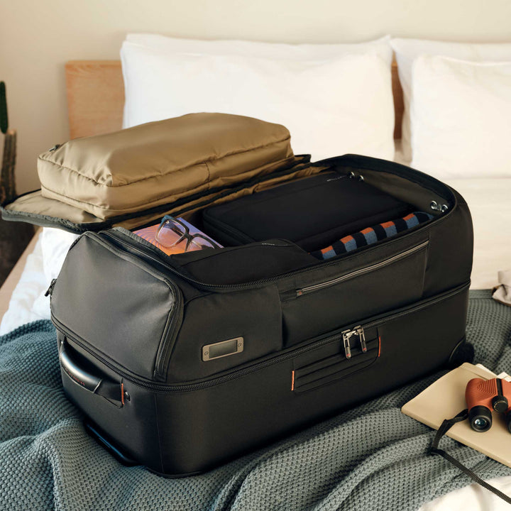 Packing Briggs & Riley ZDX Medium 2 Wheel Duffle on hotel bed