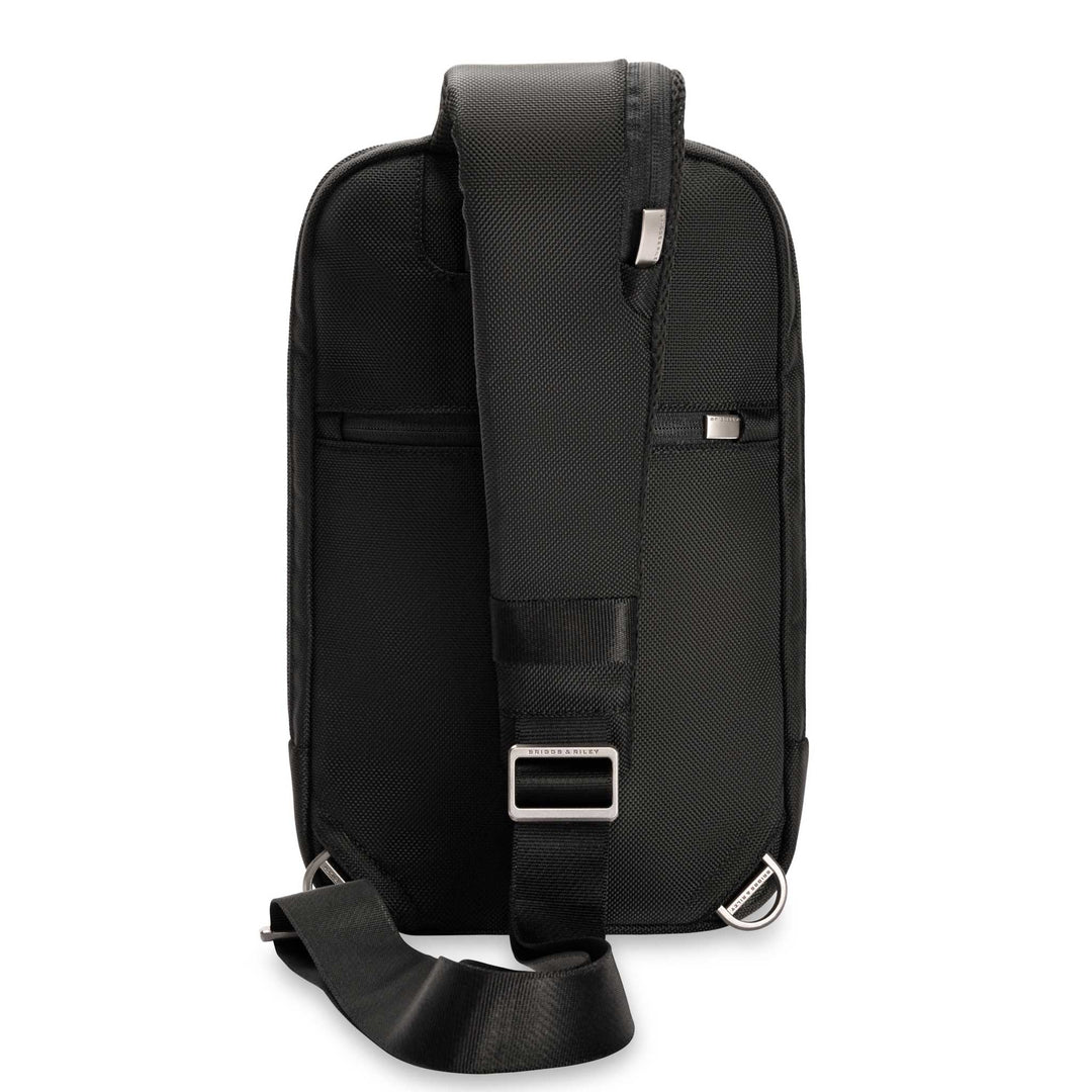 Back of sling with padded shoulder strap and hidden back pocket