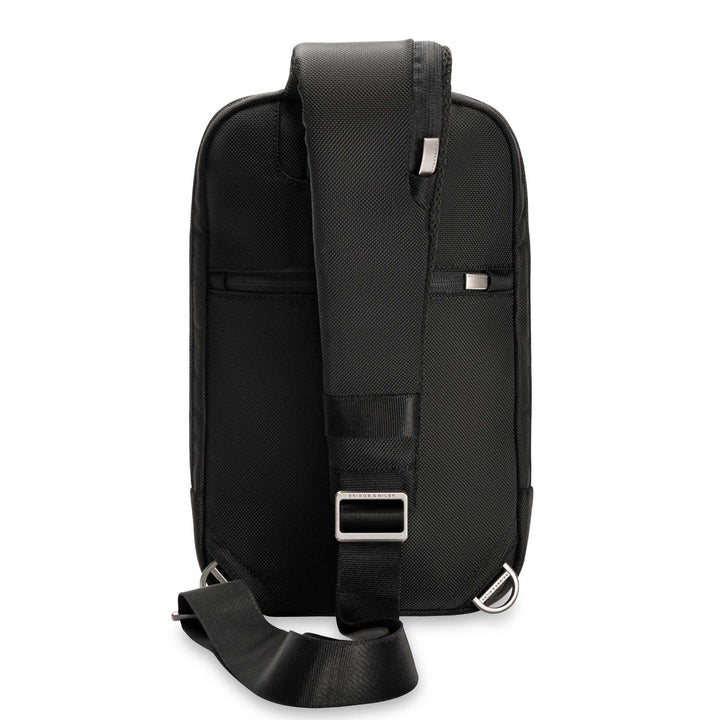 Back of sling with padded shoulder strap and hidden back pocket