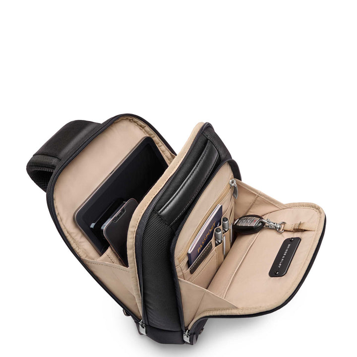 Beige interior of black sling for easy visibility