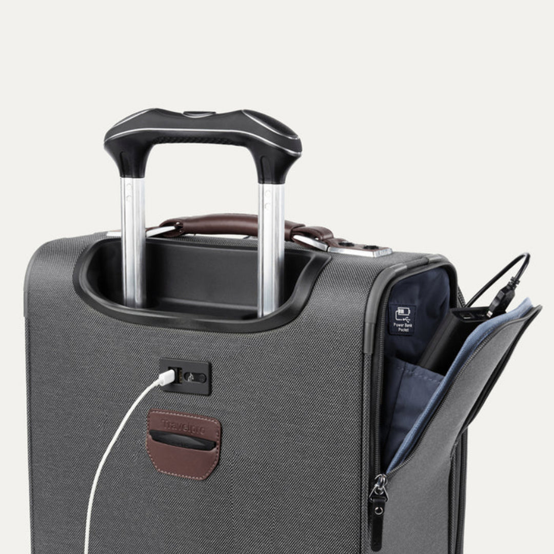 Back side of vintage grey carry on has a charging port