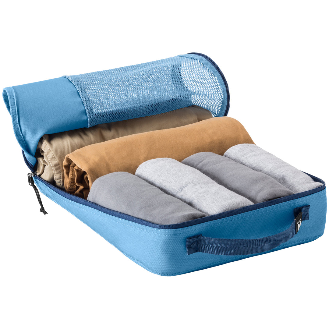 Blue Compression packing cube packed with pants and shirts as part of set