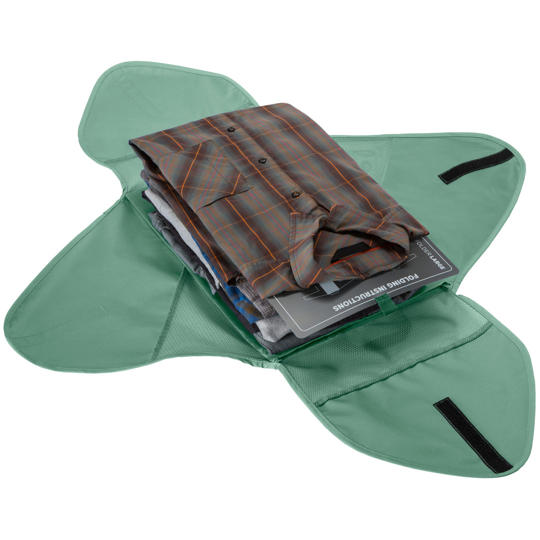 willow green Eagle Creek Pack-It® Starter Packing garment folder open with shirts packed inside