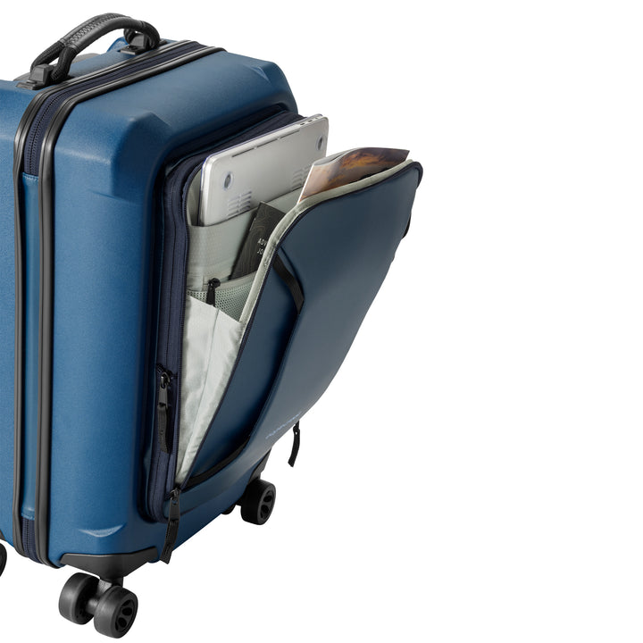Open front zippered compartment to store laptop and magazines for quick access on Tarmac carry on in color Blue