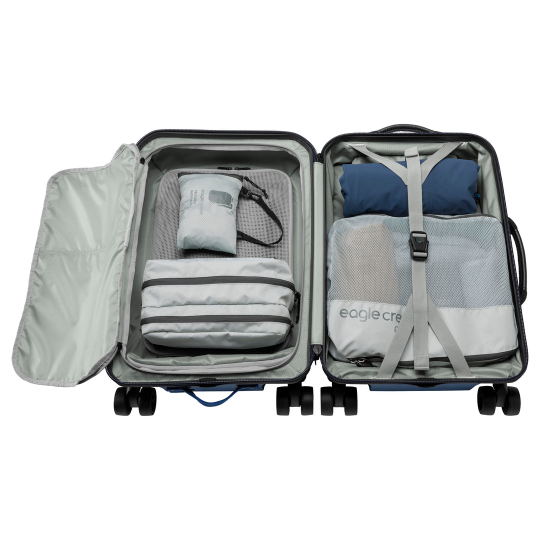 Interior of blue jay with packing cubes Eagle Creek Tarmac 4 Wheel Carry On Luggage