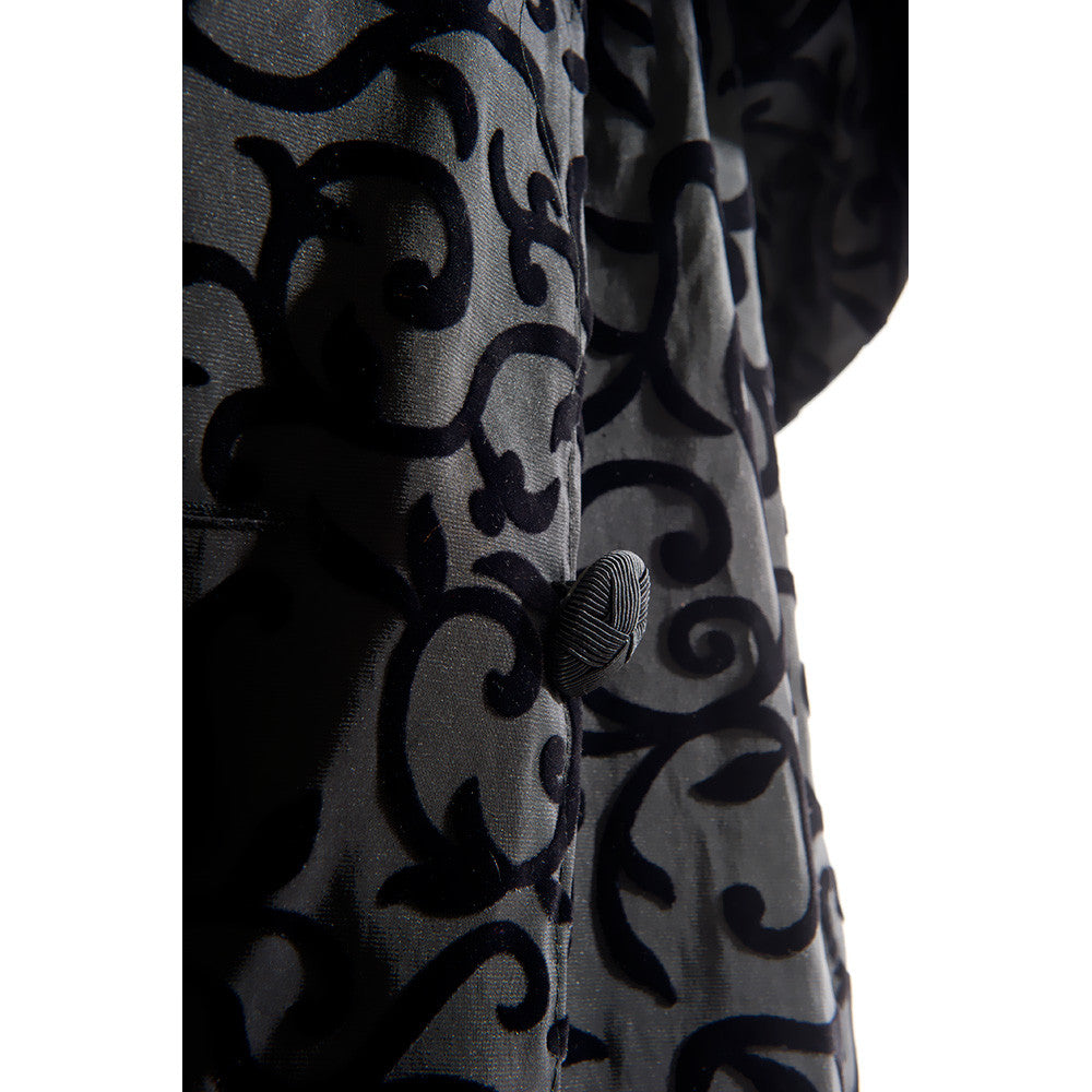 Close Up of Scroll Design on Mycra Pac Raincoat