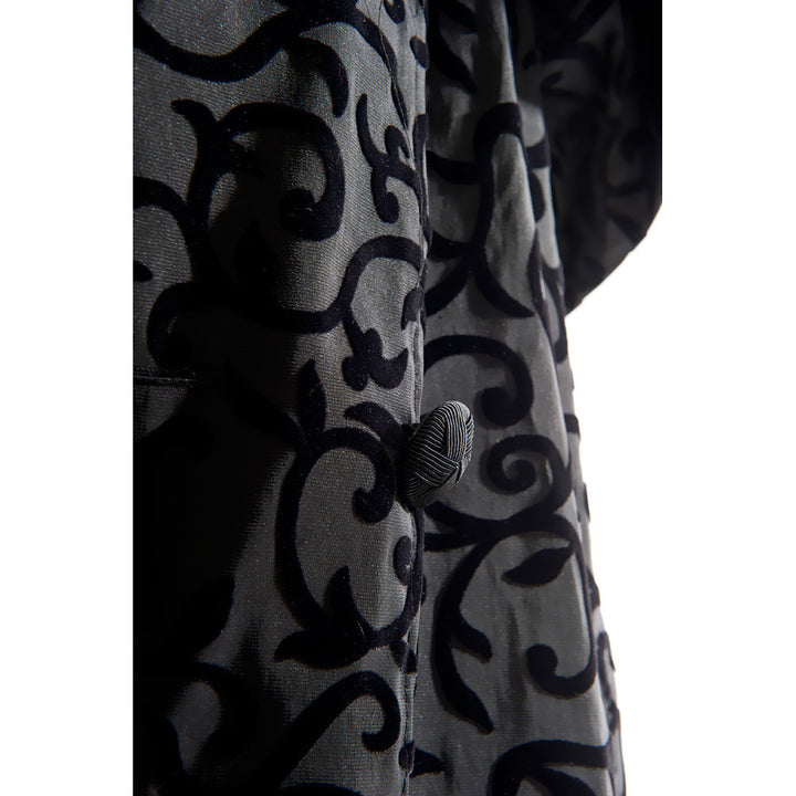 Close Up of Scroll Design on Mycra Pac Raincoat